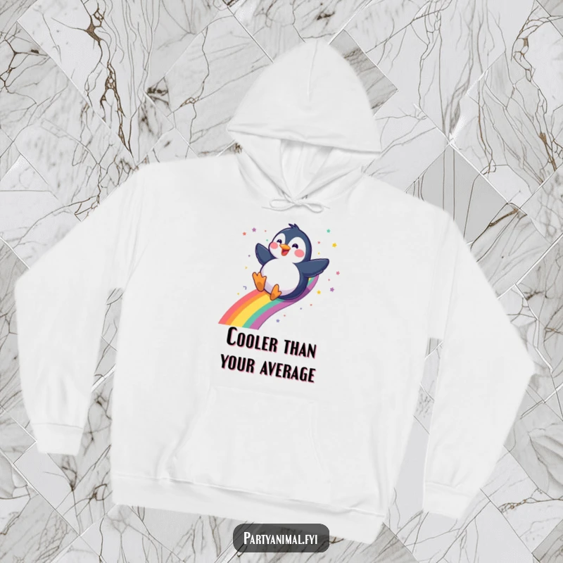 Funny gleeful penguin sliding down a rainbow with a confetti trail on a hoodie, offering warmth and whimsical charm, an excellent funny gift.