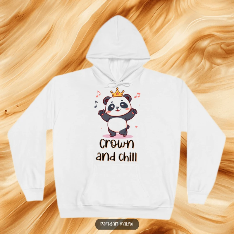 Funny hoodie displaying a cheerful panda wearing a miniature crown, caught in a groovy dance move, radiating musical joy.