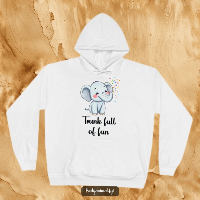 Funny hoodie featuring a joyous elephant character enthusiastically blowing a cascade of colorful confetti from its trunk, embodying pure celebration.