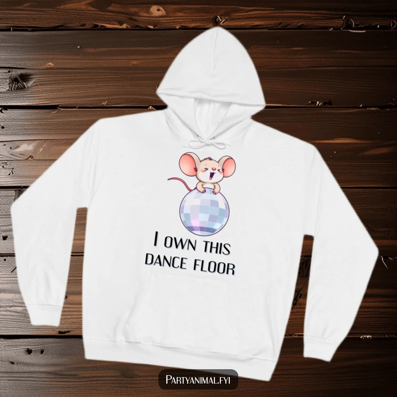 Funny hoodie depicting a tiny, overjoyed mouse character enthusiastically riding a vibrant disco ball, radiating party vibes.