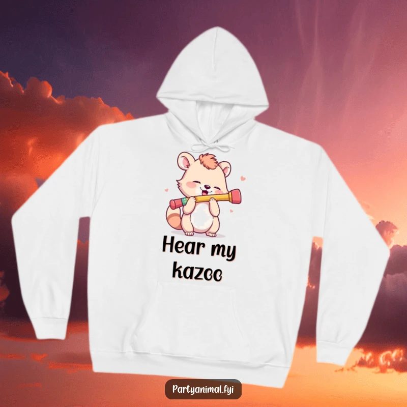 Funny Hoodie: An animal character enthusiastically plays a tiny, colorful kazoo, embodying musical fun.