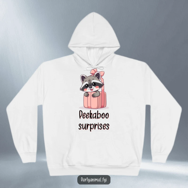 Funny raccoon hoodie featuring a giggling raccoon peeking from behind a large unwrapped gift, perfect for cozy mischief.