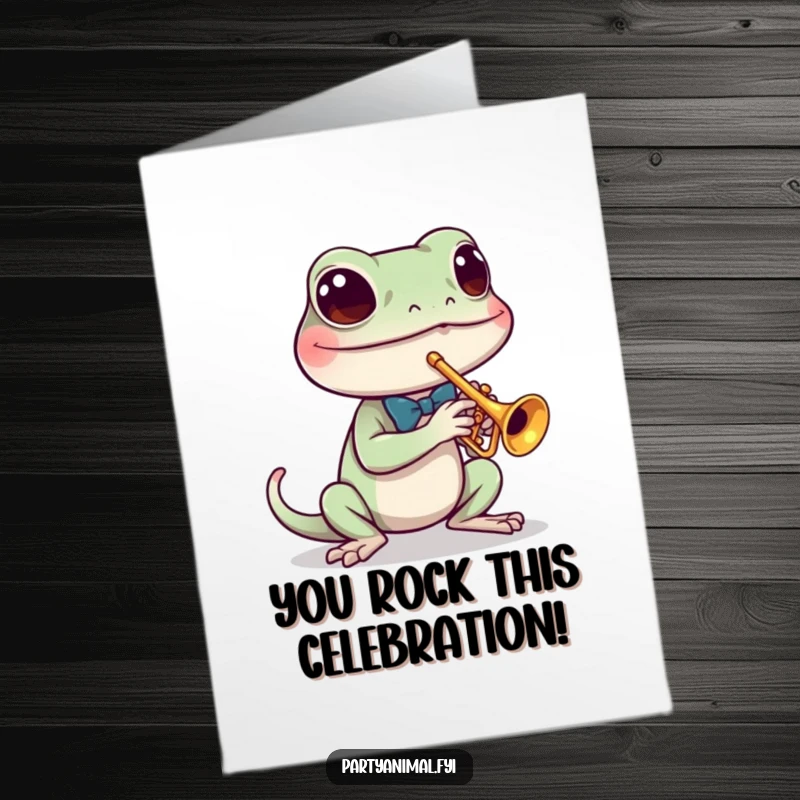 Funny Free Printable Gecko Congratulations Card: A gecko plays a triumphant tune on its tiny trumpet, celebrating success.