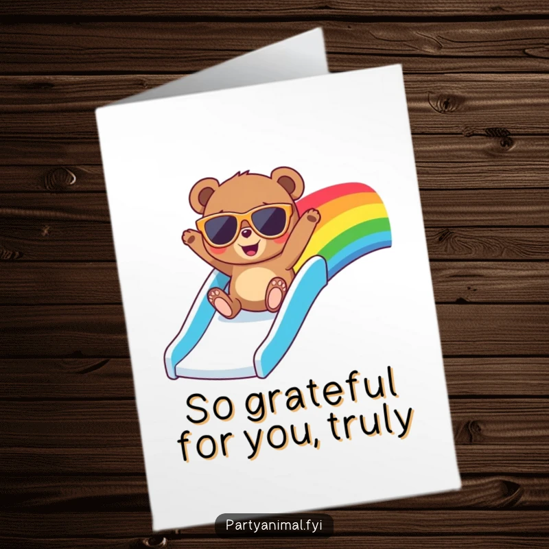 Funny free printable thank you card featuring a bear in large sunglasses, sliding down a rainbow with a cheerful and grateful expression.