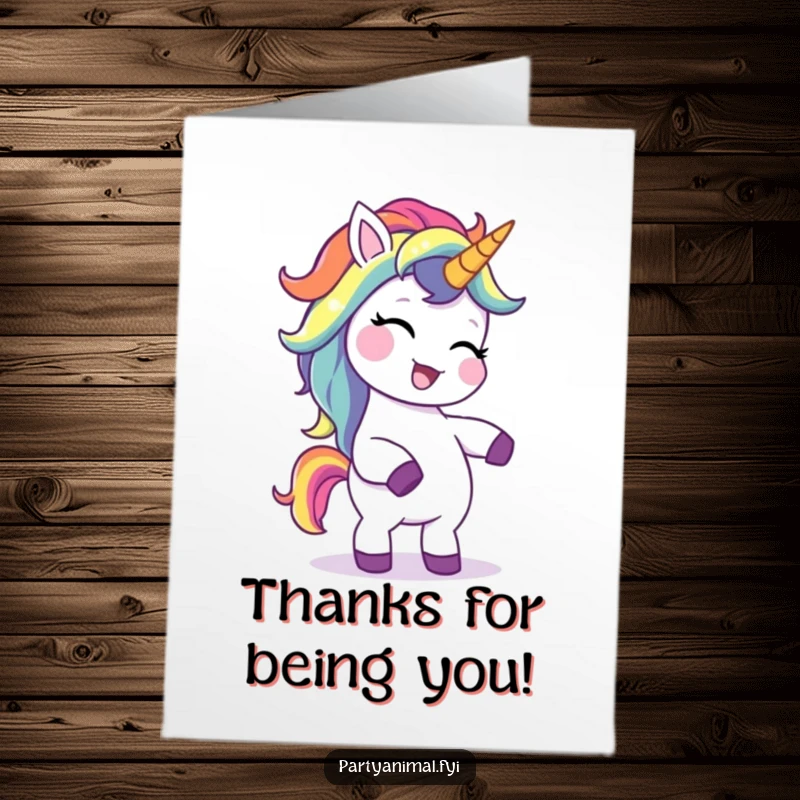 Funny Free Printable Thank You Card: A giggling unicorn with a vibrant rainbow mane dances to express thanks.