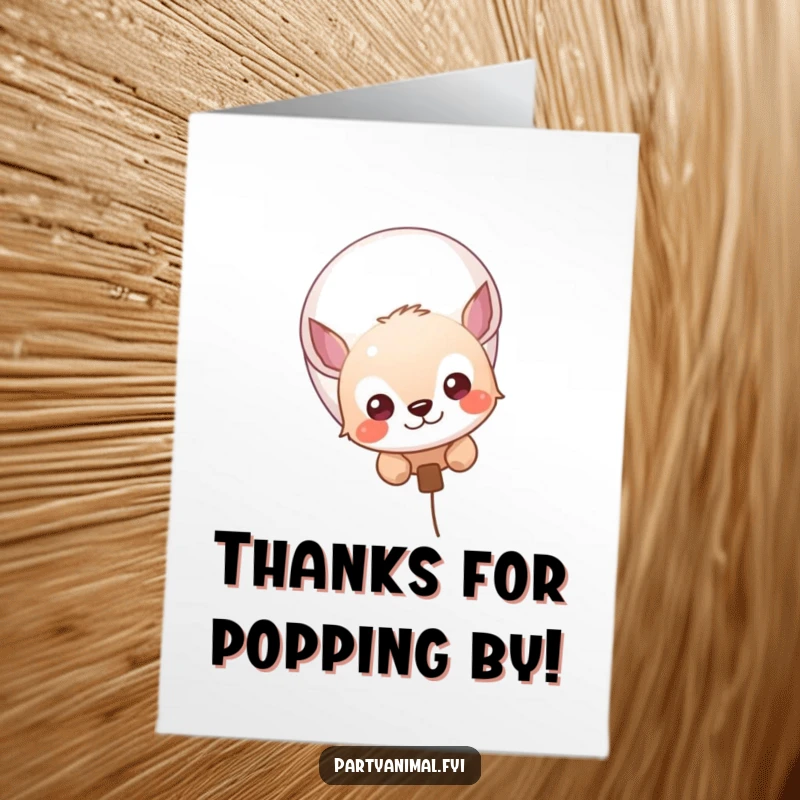 Funny Free Printable Thank You Card: A wide-eyed curious animal character peeks from behind a festive balloon, offering its thanks adorably.